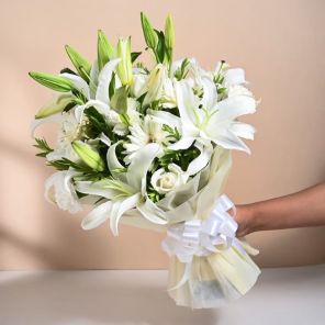 4 White Oriental Lilies 3 Gerberas 3 Roses n 3 Carnation Bouquet