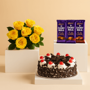 Half Kg Black Forest Cake with 6 Yellow Roses Bunch and 3 Cadbury Silk Chocolates