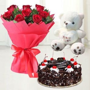Eggless Half Kg Classic Black Forest Cake with 6 Red Roses Bouquet and 6 Inch Teddy Bear