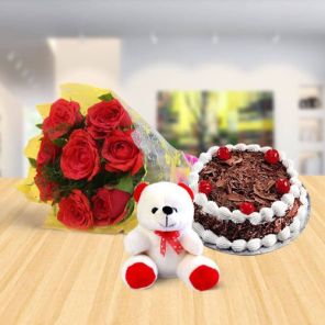 Half Kg Delicious Black Forest Cake with 6 Red Roses and 6 Inch Teddy Bear