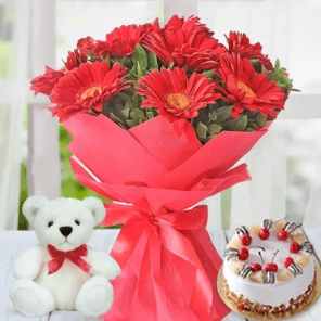 Eggless Half Kg Delish Butterscotch Cake with 6 Red Gerberas and 6 Inch Teddy Bear